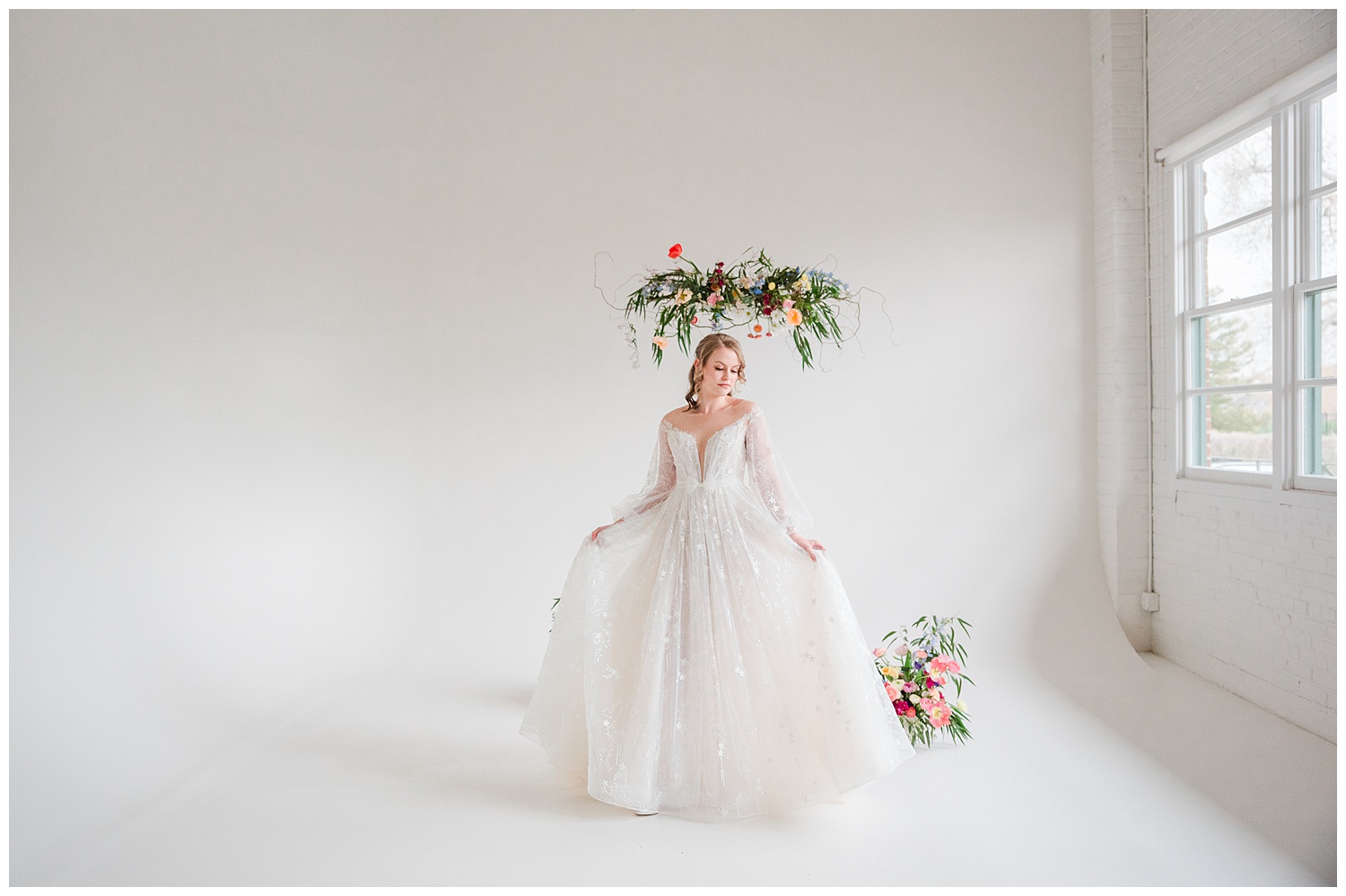 A bride dances in the open space of Realm Denver, one of the most stunning wedding venues denver has to offer