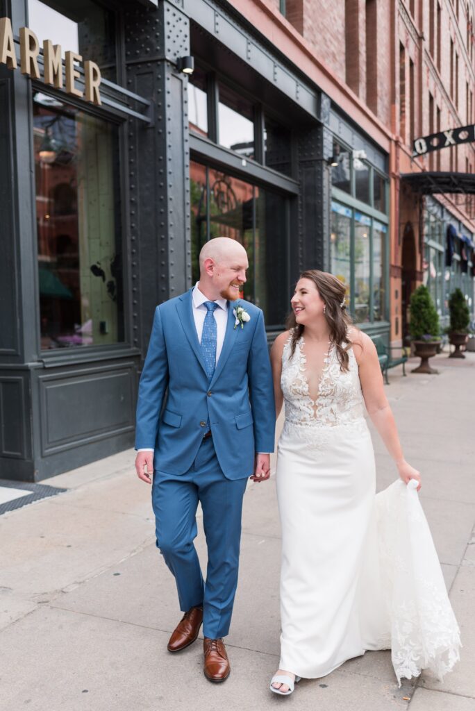Denver wedding photographers dream is to capture a couple walking along downtown Denver sidewalk, truly capturing the essence of the heart of Denver 